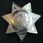 This badge was worn by Cal Poly University Police, who were deputized by the Sheriff. This was prior to the University formed their own police department.